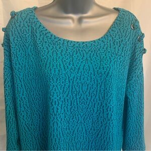 Ladies Onque Turquoise knit top szXL. $10